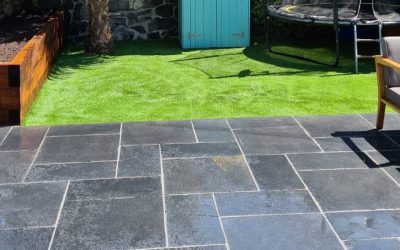Small backyard redesign using sandstone tilling