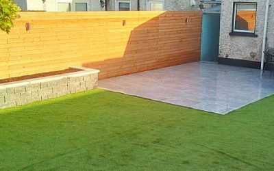 Complete garden remake with artificial grass and porcelain paving